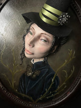 Load image into Gallery viewer, Close view of Edris's hand-sculpted face and real butterfly