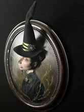 Load image into Gallery viewer, Side view showing Edris's sculpted profile and deep oval frame