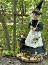 Load image into Gallery viewer, Madame Tinker in the woodland beside her clockwork case