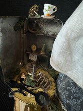 Load image into Gallery viewer, Detail of the miniature clockwork workshop with gears and teacup