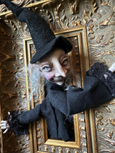 Load image into Gallery viewer, Close-up of the witch’s sculpted face and silver hair