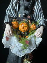 Load image into Gallery viewer, Close-up of Hester Briarhollow's pumpkin babies gathered in her lace apron