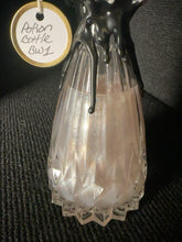 Load image into Gallery viewer, Close view of BW1 pink potion transformed into shimmering silver