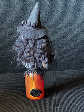 Load image into Gallery viewer, Back view of BW11 showing black curly hair and artist seal