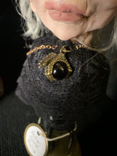 Load image into Gallery viewer, Close view of BW12 brass dragon claw ornament holding a black orb