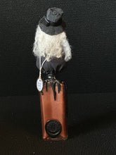 Load image into Gallery viewer, Back view of BW4 Viktor showing white curls and artist seal