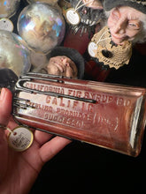 Load image into Gallery viewer, Detail of Viktor's embossed California Fig Syrup Co. CALIFIG bottle